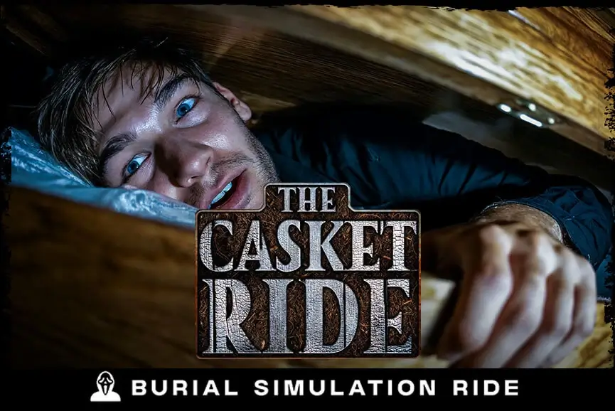 Terrified guest inside The Casket Ride burial simulation at Folklore Haunted House Georgia